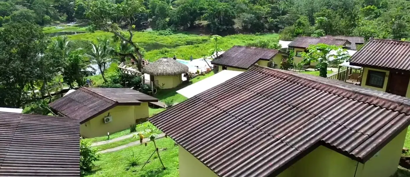 Aerial view of the Gatun Lake Lodge cabins in the rainforest